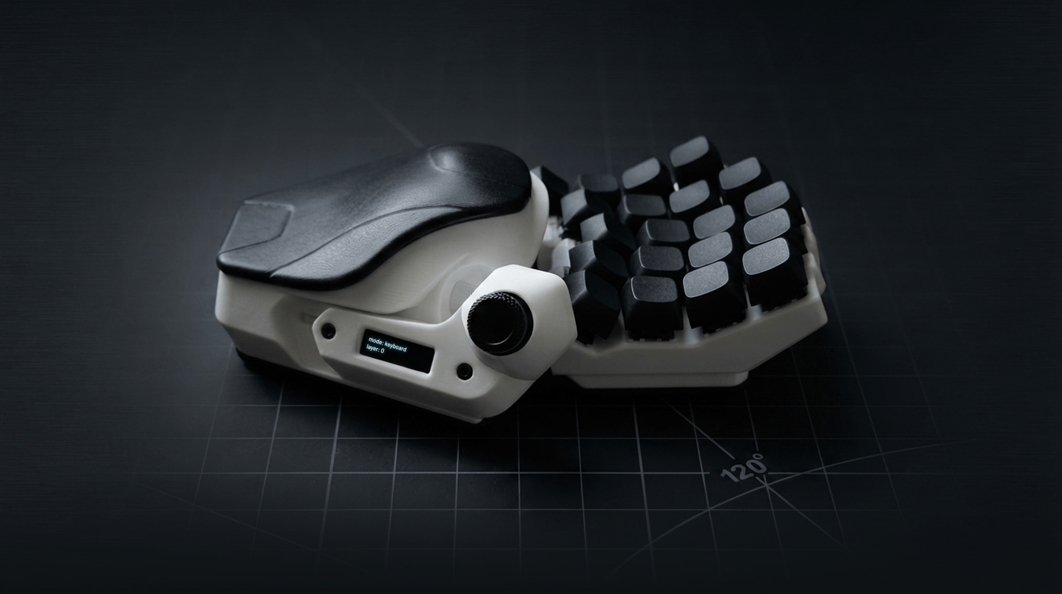 MLTFEX split ergonomic keypad, angled 120 degrees, resting on a dark grid surface, with an OLED status display reading mode: keyboard, layer: 0